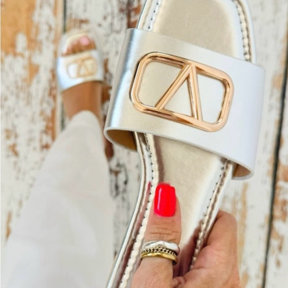 LAST WEEK!!! Consignment store bound! Silver slides with gold accent.